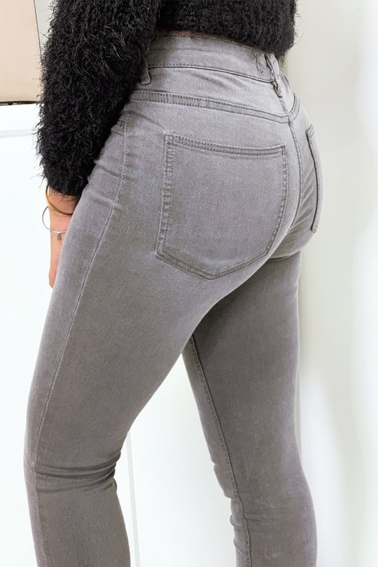 Jeans slim gris avec poches arrière