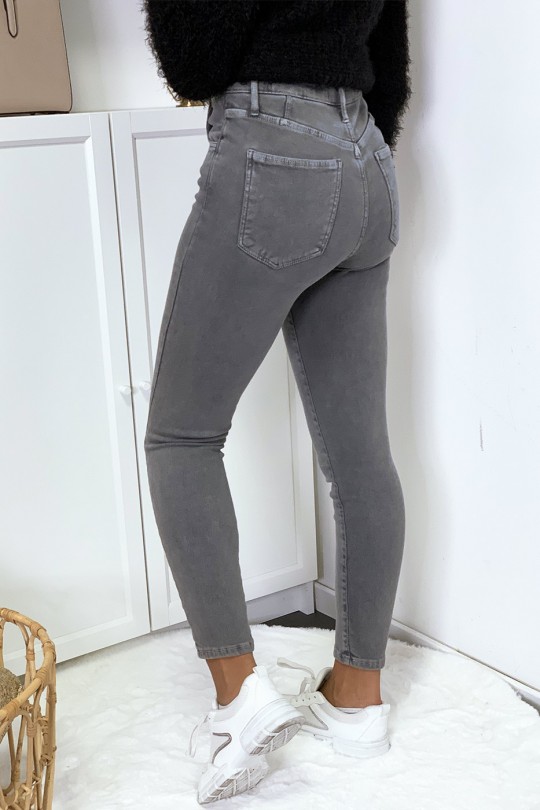 Jeans gris en taille haute très extensible avec poches