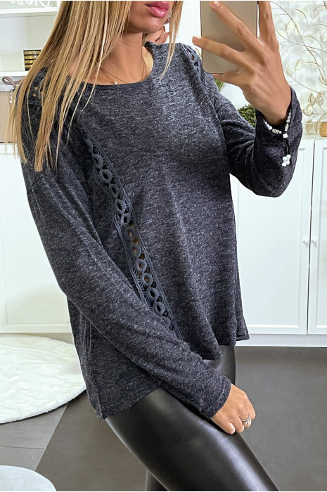 Pull marine chiné à broderie sur les côtés. - 1