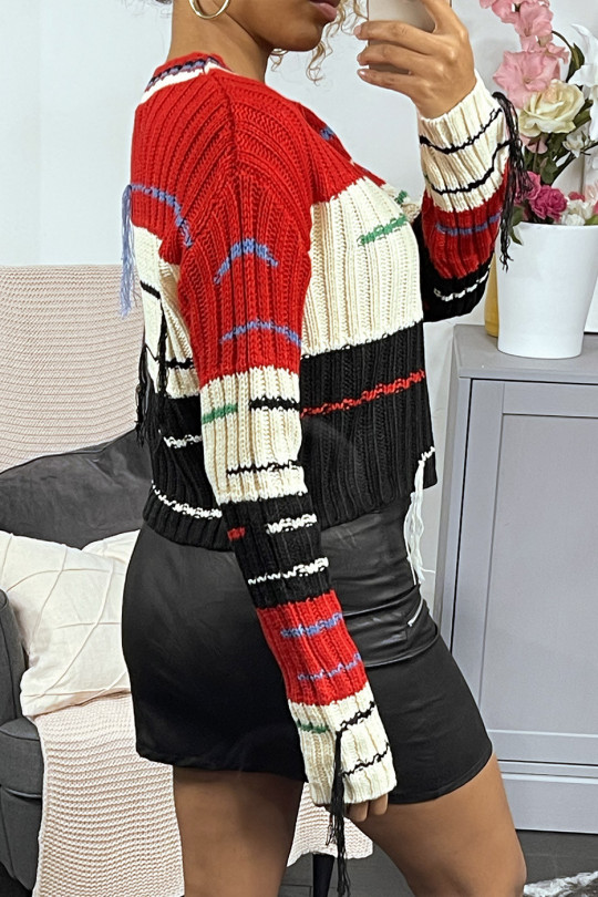 Cropped jumper with predominantly red cable knit and fringe - 9