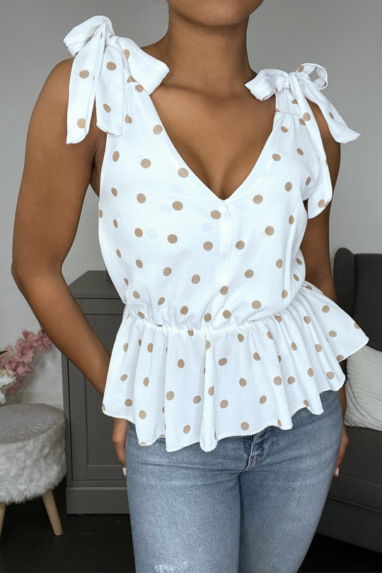White peplum top with black polka dots and tie at the shoulders - 1