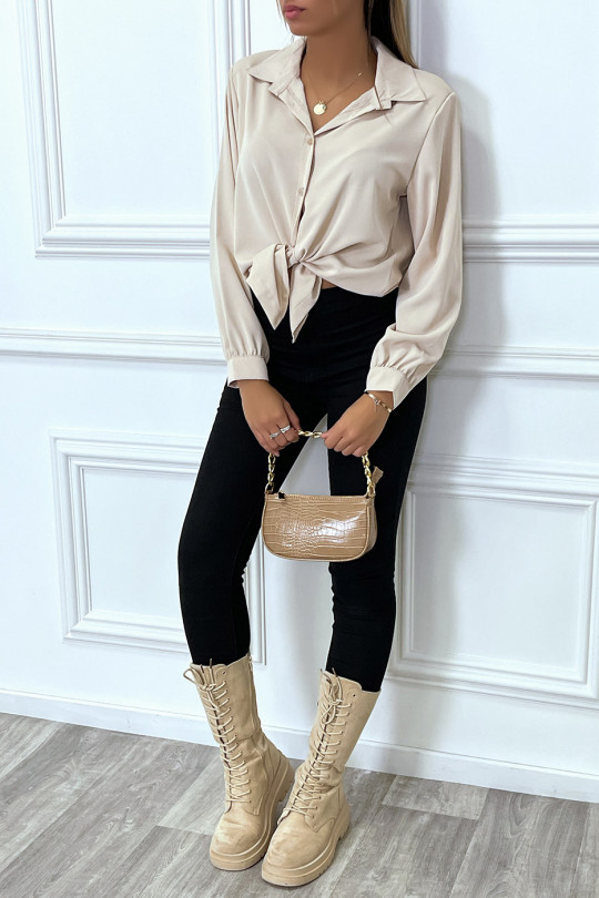 Beige shirt with shoulder pads in a beautiful falling material - 1