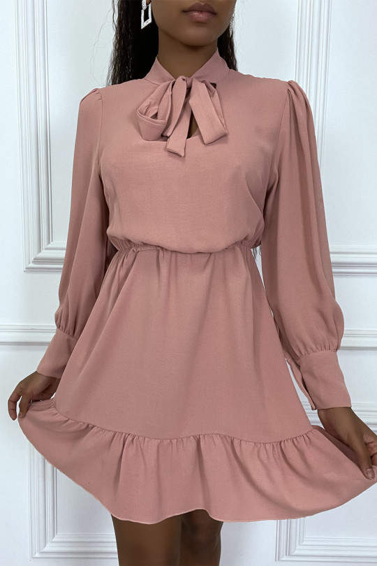 Pink skater dress with ruffle and bow at the neck - 1