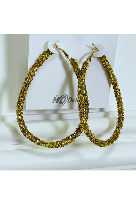 Boucles d'oreille créoles en forme de gouttes dorées - 3