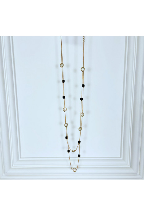 Collier sautoir femme doré serti de pierres noires et transparentes
