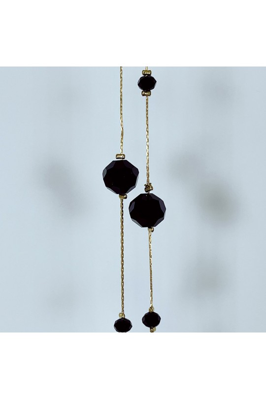 Collier sautoir doré avec pierres transparentes brillantes noires