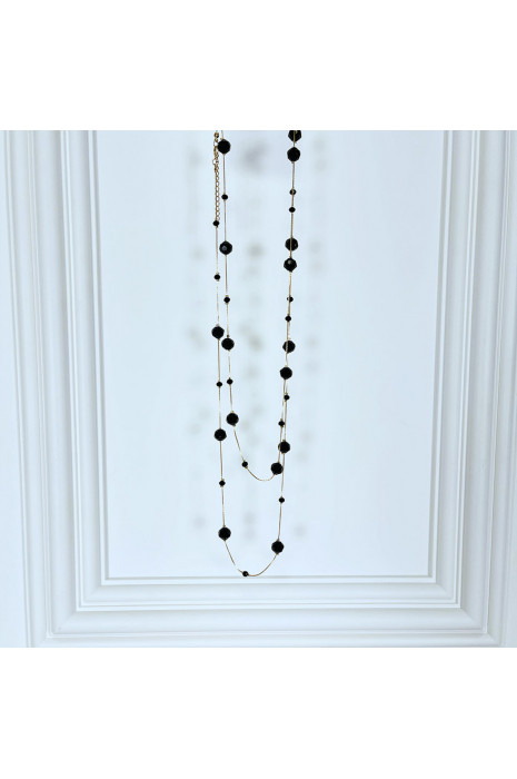 Collier sautoir doré avec pierres transparentes brillantes