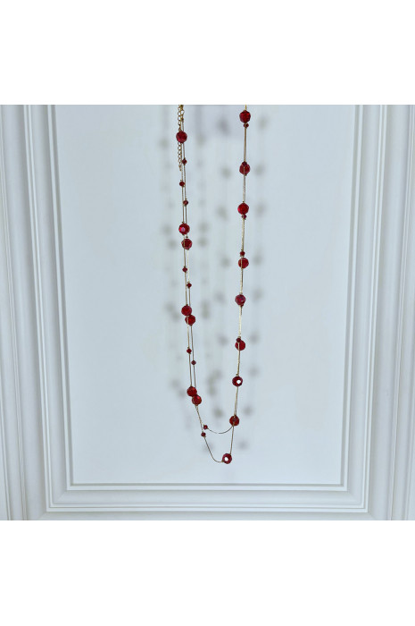 Collier sautoir doré avec pierres transparentes brillantes rouges