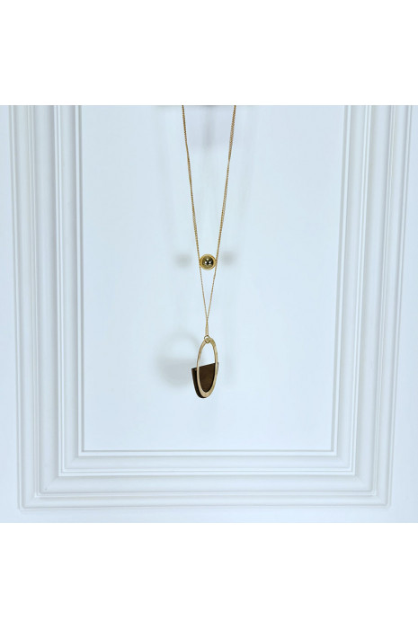 Collier doré long façon sautoir avec perle et bois