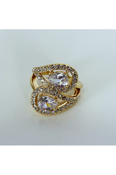 Bague brillante dorée avec pierres entremêlées