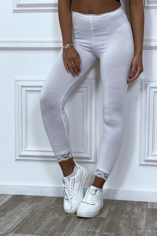 White leggings with lace at the waist and bottom