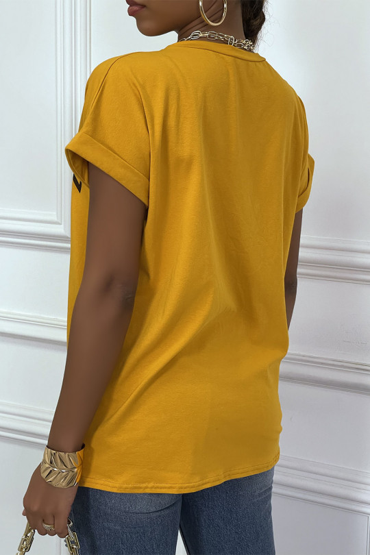 Loose mustard t-shirt with REBEL writing and lion head - 6