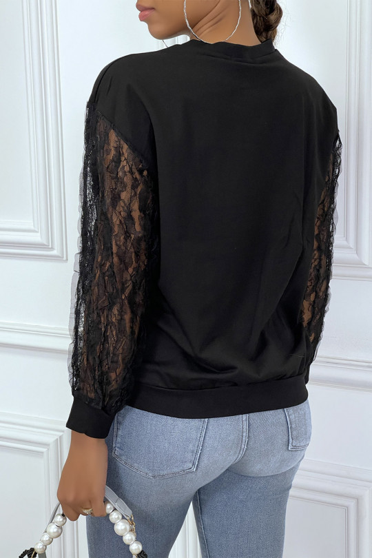 Black sweater with pattern print and lace sleeves - 1