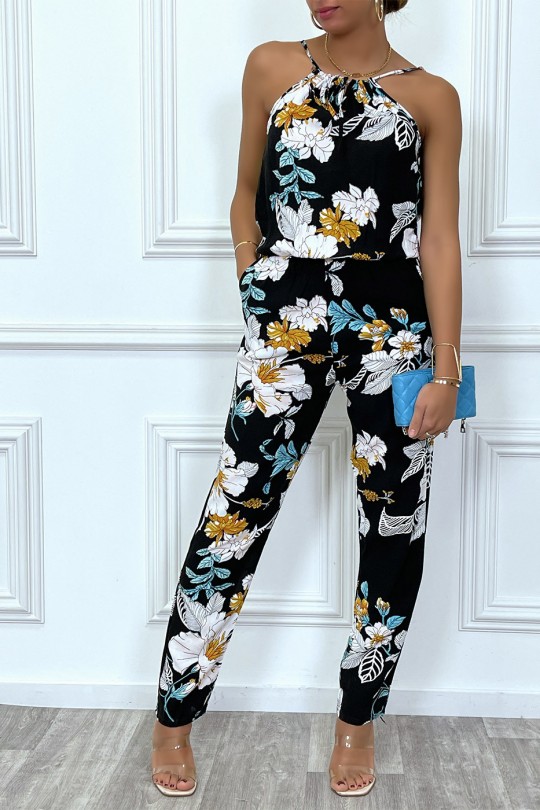 Black jumpsuit with yellow and turquoise flowers - 1