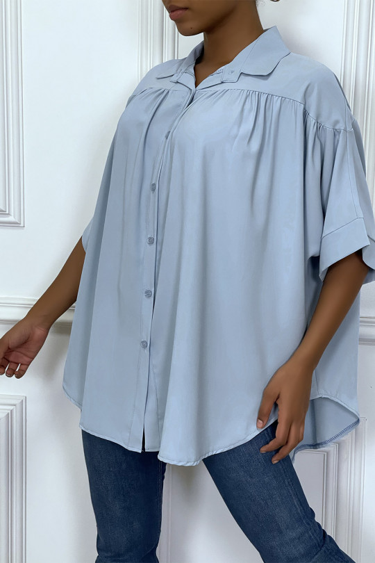 Oversized turquoise blouse met korte mouwen - 1