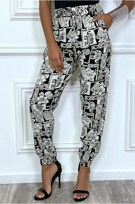 Fluid navy pants with baroque print