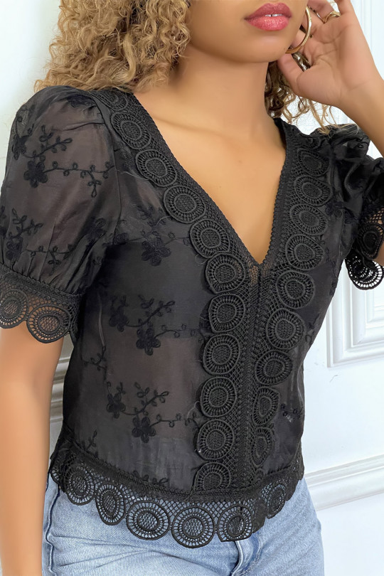 Zwarte opengewerkte blouse met V-hals - 1