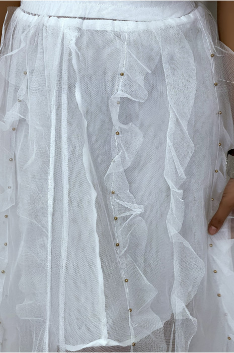 Jupe longue rose en tulle à volants et petits clous. - 1