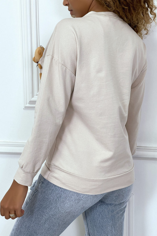 Long-sleeved beige sweater with blanket pocket - 1