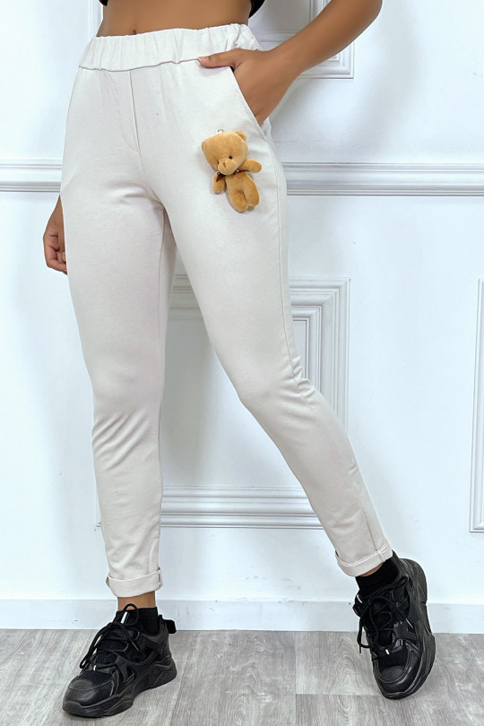 Beige joggers with soft toy and pockets - 1