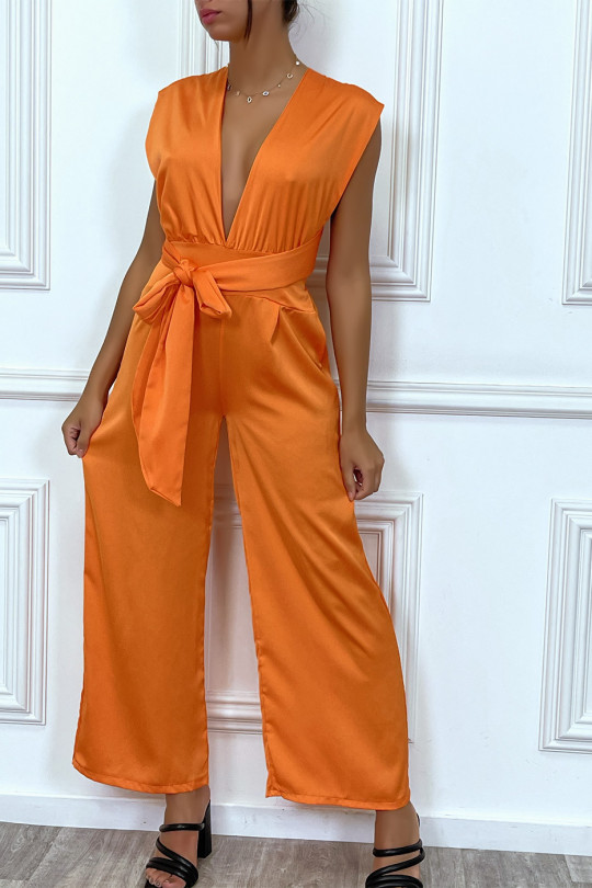Orange satin jumpsuit with plunging neck and adjustable tie at the back - 1
