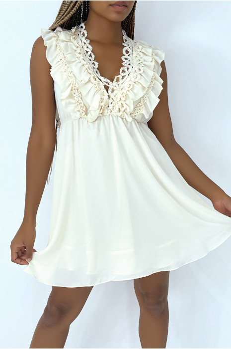 Little fluid ecru dress with ruffle details and embroidery on the top - 1
