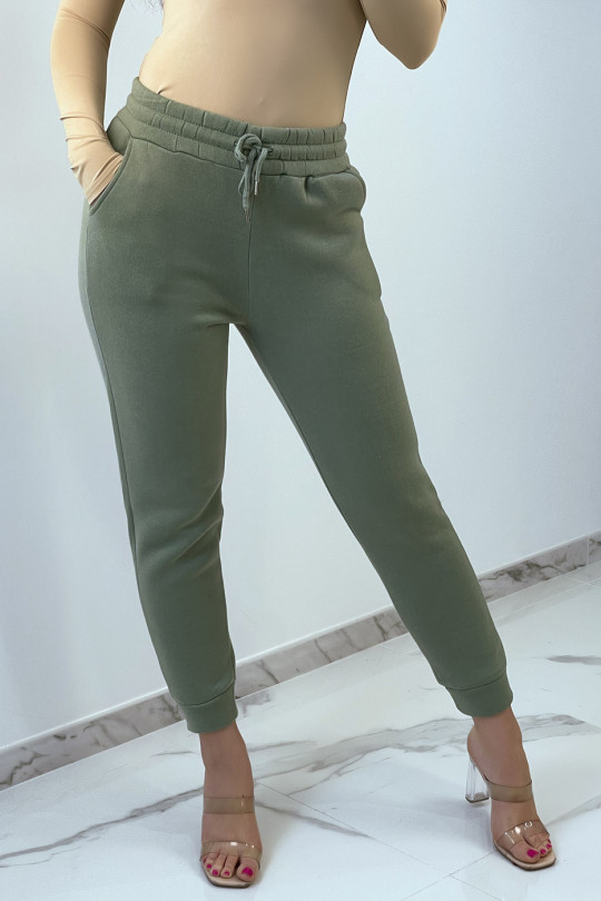 Green water jogging bottoms with soft material and fleece interior - 1