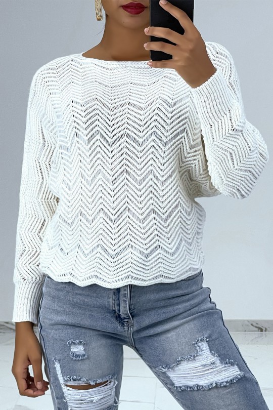 White sweater with batwing sleeves and knit patterns - 1