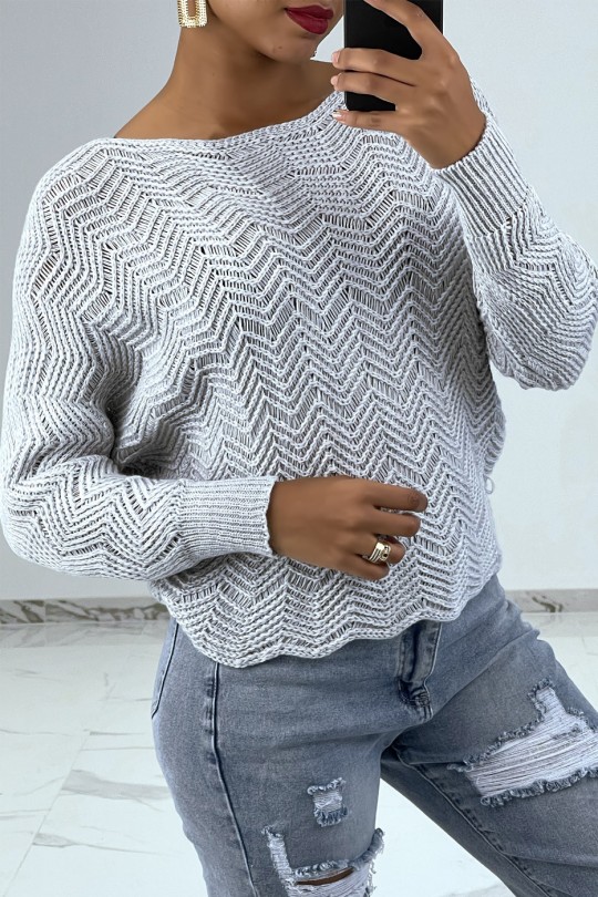 Gray sweater with batwing sleeves and knit patterns - 1