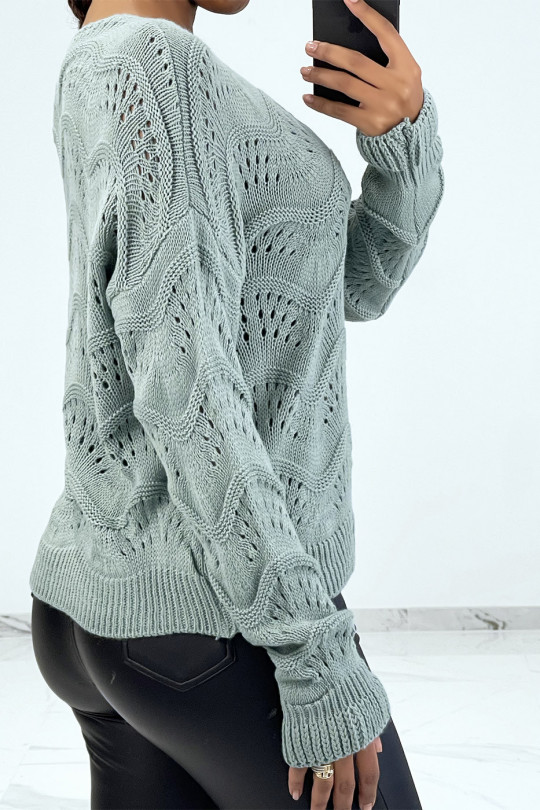 Green ribbed knit sweater with geometric patterns and oversized sleeves - 3