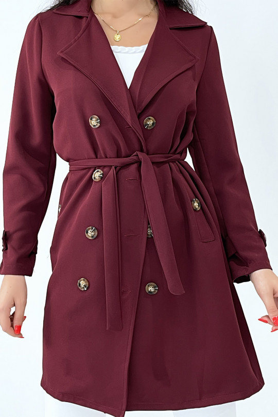 Long burgundy trench coat with pockets. Trendy women's jacket new collection