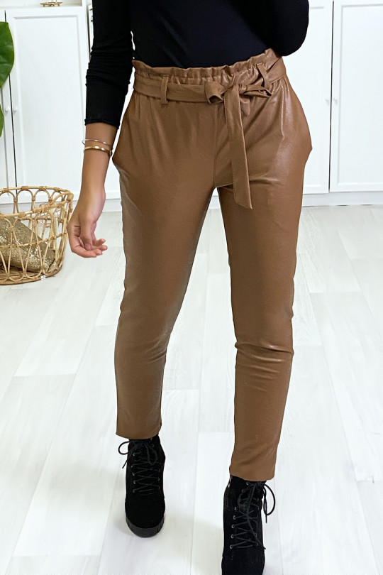 Camel carrot cut pants with gathered waist and belt. - 1