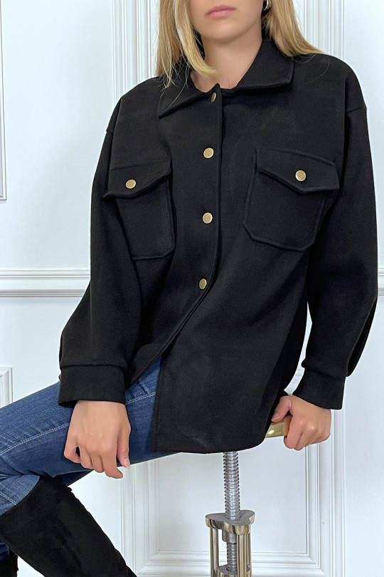 Dikke zwarte jas met zakken en stijlknopen op het shirt - 3