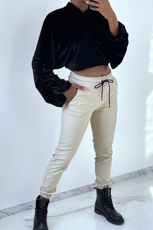 Beige faux leather jogging pants with pockets. Fashionable women's jogging pants - 1