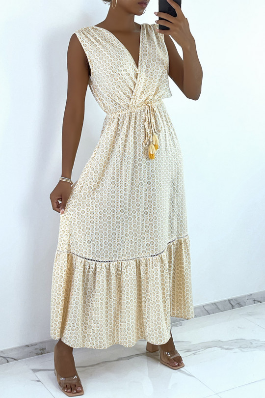 Long crossover dress in beige with pattern and lace - 1