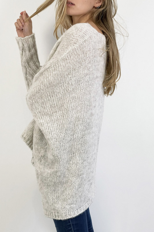 Long loose beige knit effect sweater with braid detail in the center - 4