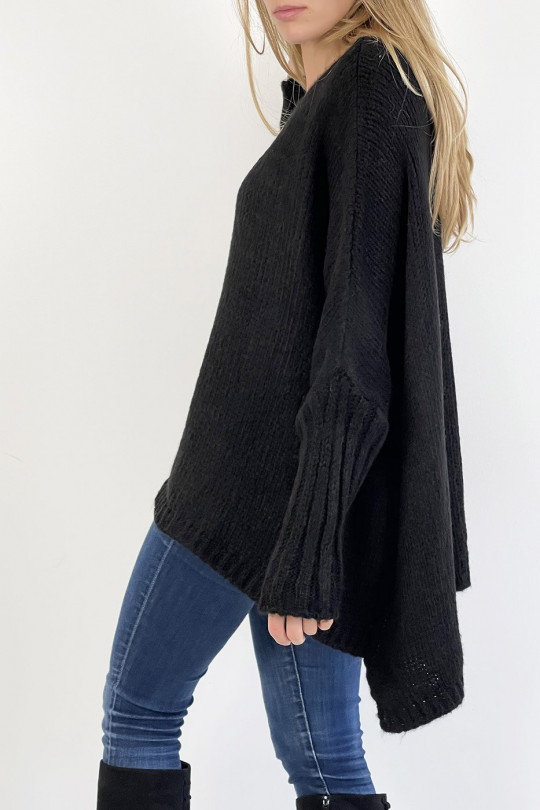 Lange losse zwarte trui met mesh-effect en vlechtdetail in het midden - 4