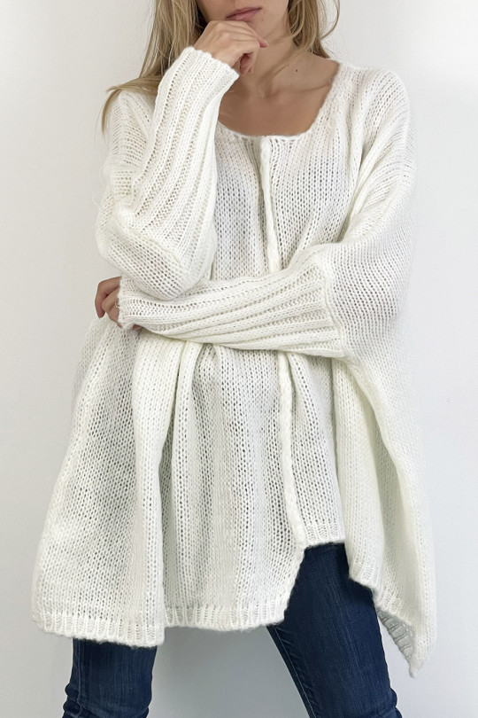 Lange losvallende witte trui met brei-effect en vlechtdetail in het midden - 12