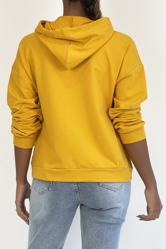 Mustard hoodie with pocket and SQUID GAMER writing - 1