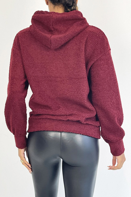 Short burgundy Squid Game hoodie with a very soft and warm toupee effect with geometric shape on the chest. - 1