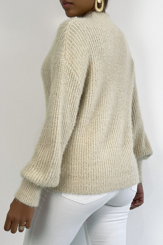 Pull tout doux à motif en grosse maille et manches bouffantes. Pull tout doux à motif en grosse maille et manches bouffantes.