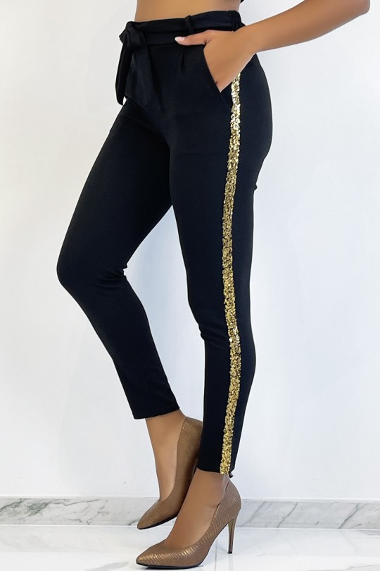 Zwarte soepelvallende broek met gouden banden en pailletten - 1