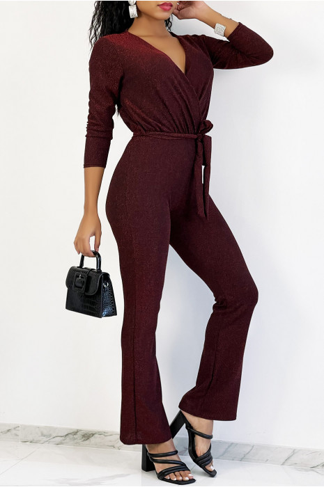 Rode jumpsuit met overslag en uitlopende broek met lovertjes - 1