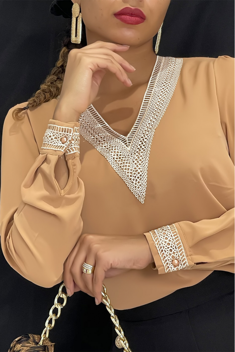 Camel V-neck blouse with lace at the collar and sleeves. Women's blouse