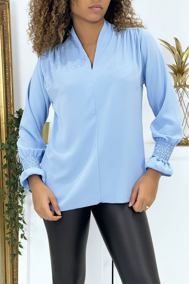 Turquoise blouse met V-hals en donkere armen - 2
