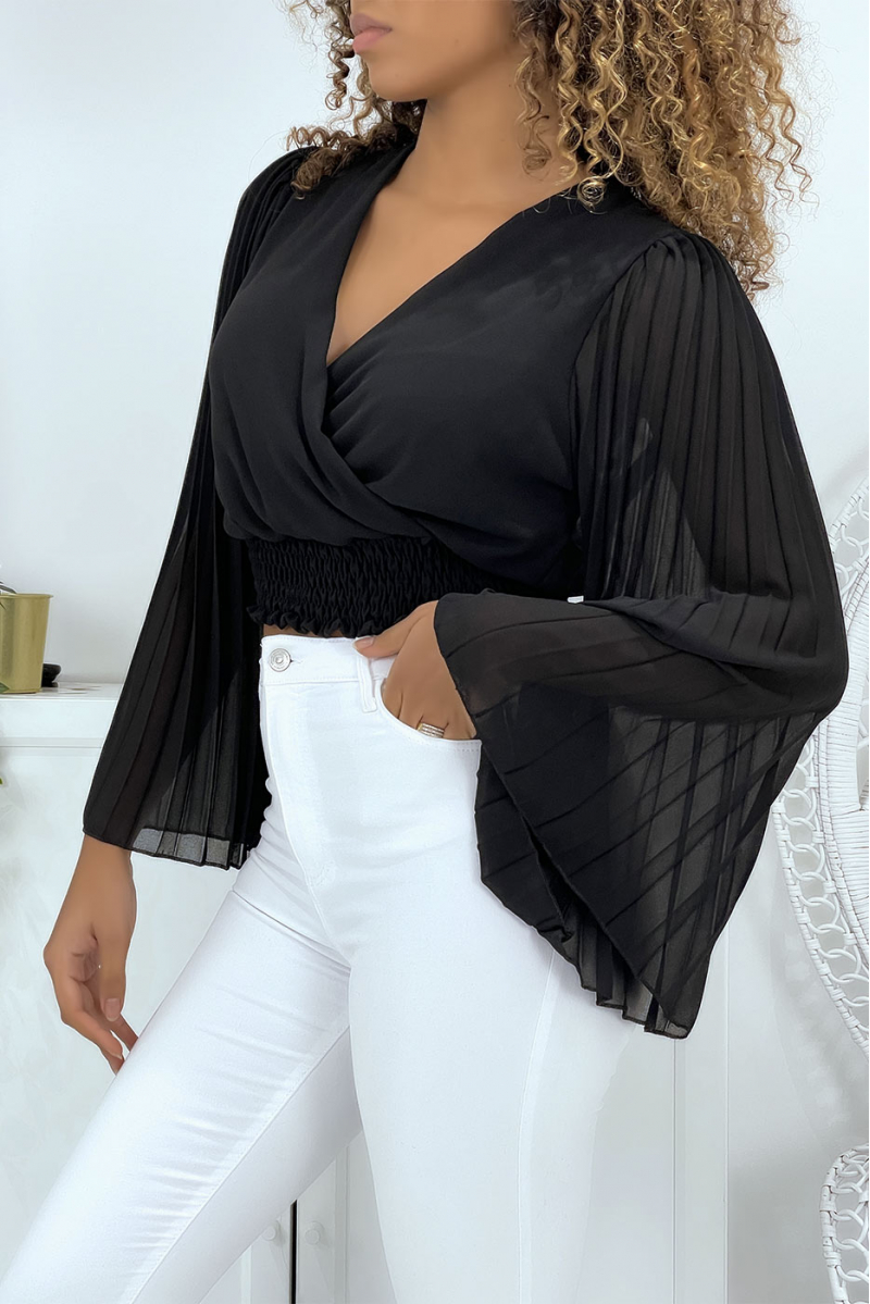 Zwarte wikkelblouse met aangerimpelde mouwen. Damesblouse - 1