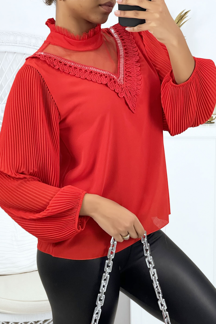 Red blouse with lace and pleated sleeves