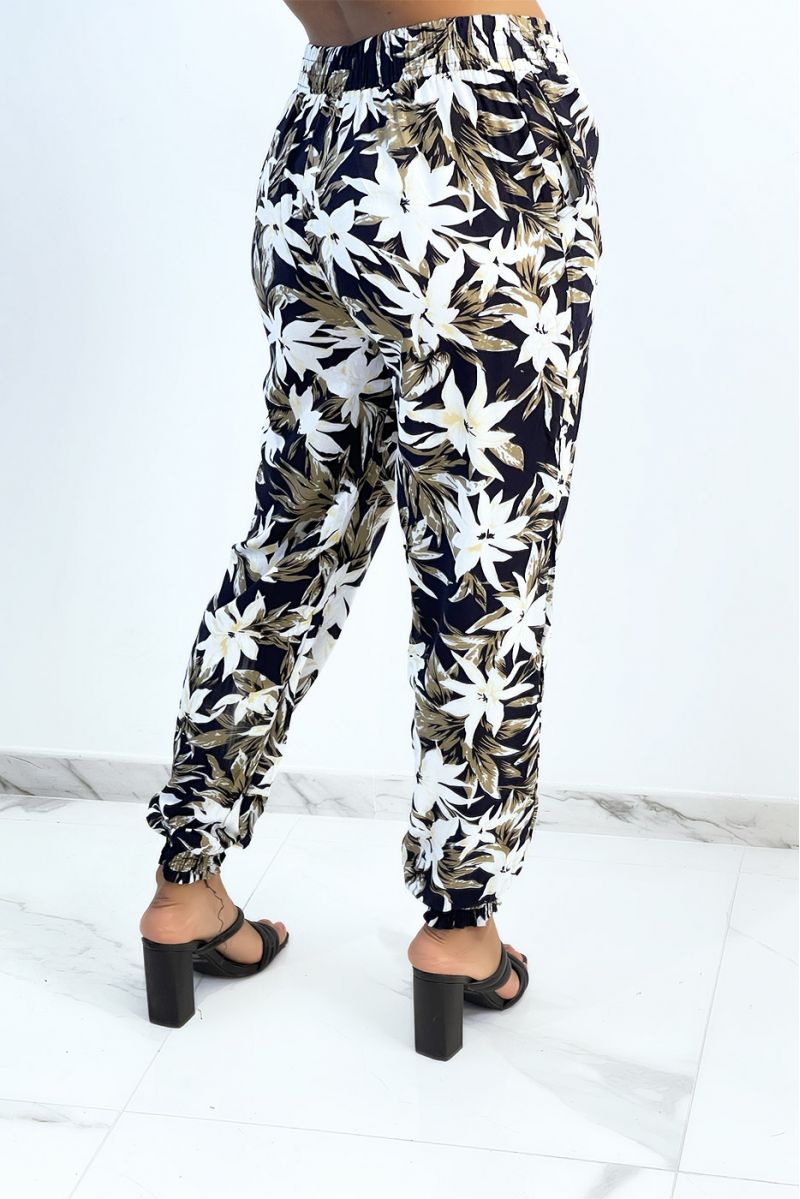 Fluid navy pants with tropical print tightened at the ankles - 2