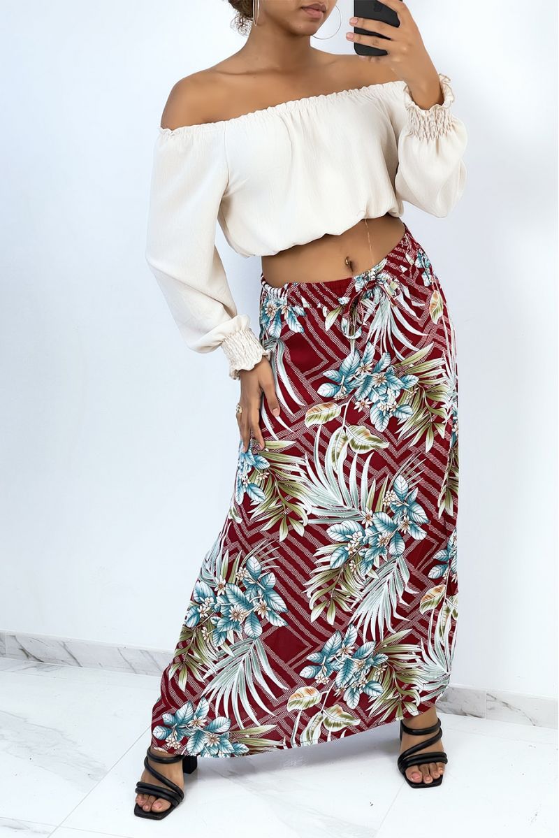 Long burgundy flared skirt with tropical and floral print - 1