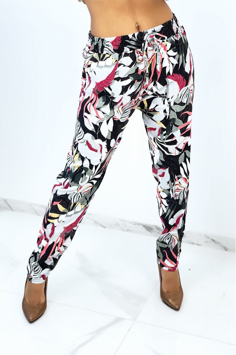 Fluid straight-cut black pants with large tropical print - 1